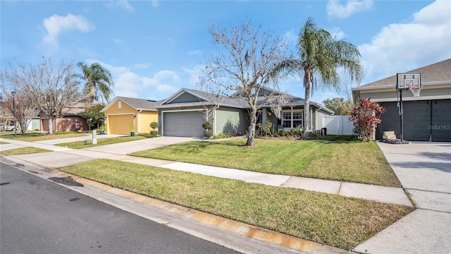 ranch-style house with a garage and a front yard