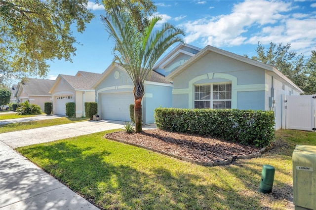 ranch-style house featuring a garage and a front lawn