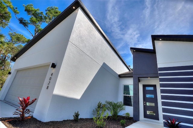 view of front of home with a garage