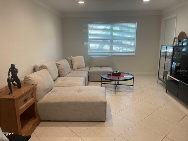 living room featuring light tile patterned floors and ornamental molding