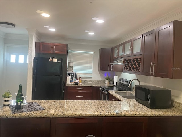 kitchen with crown molding, light stone countertops, and black appliances