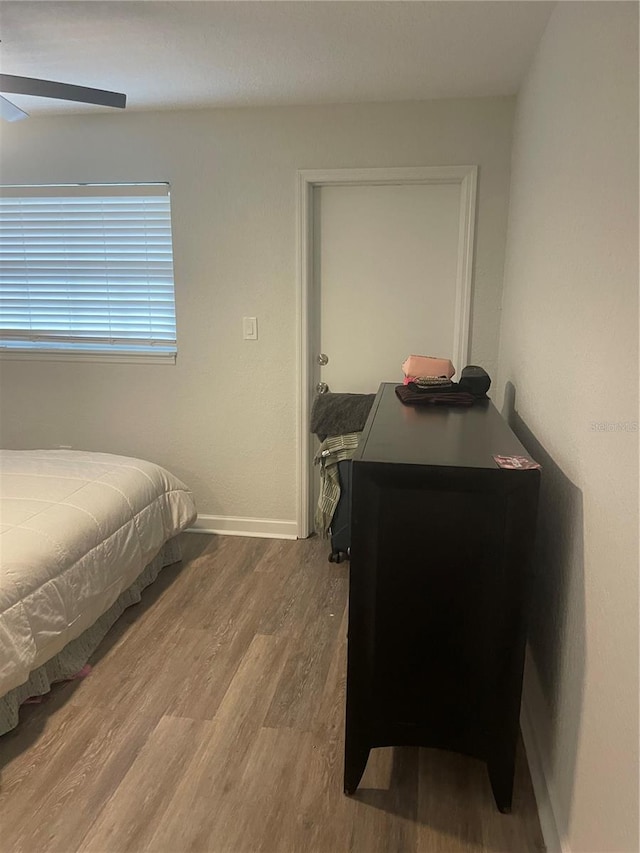 bedroom featuring hardwood / wood-style flooring