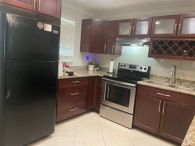 kitchen featuring stainless steel electric stove, black refrigerator, sink, ornamental molding, and light stone counters