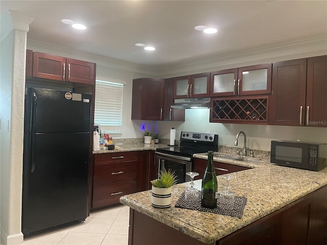 kitchen featuring sink, light tile patterned floors, black appliances, crown molding, and light stone countertops