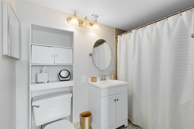 bathroom featuring vanity, a shower with curtain, and toilet