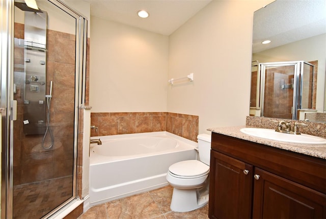 full bathroom with plus walk in shower, vanity, and toilet