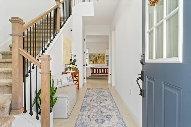 foyer with light tile patterned floors