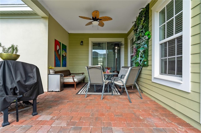 view of patio with ceiling fan