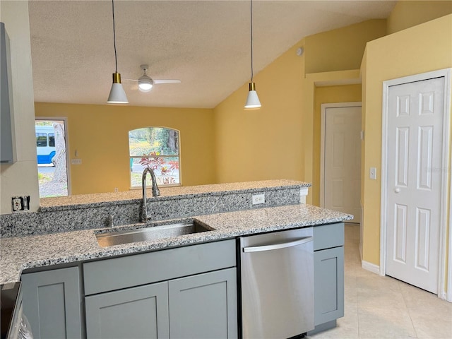 kitchen with a sink, pendant lighting, dishwasher, and gray cabinetry