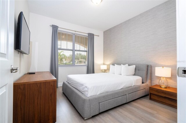 bedroom featuring light hardwood / wood-style flooring