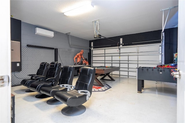 garage with a garage door opener, a wall mounted air conditioner, and electric panel