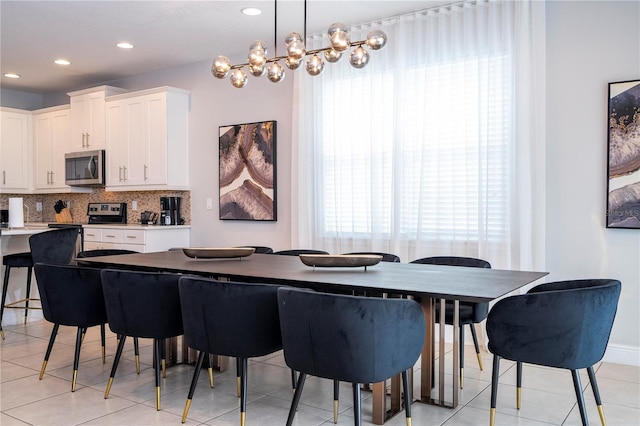 dining room with light tile patterned flooring