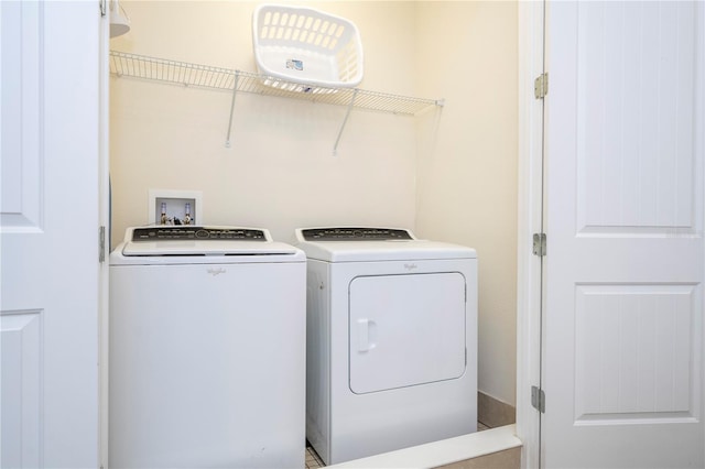 laundry area featuring independent washer and dryer