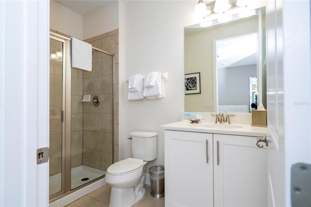 bathroom with walk in shower, tile patterned floors, vanity, and toilet