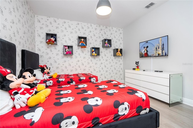 bedroom featuring light hardwood / wood-style floors