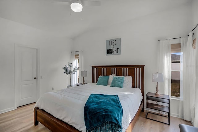 bedroom with ceiling fan and light hardwood / wood-style floors