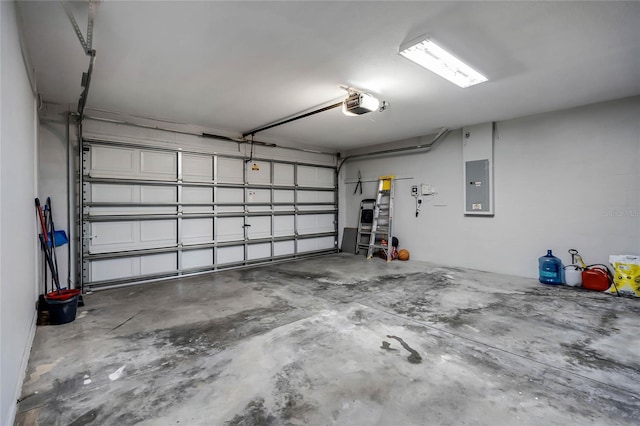 garage featuring a garage door opener and electric panel