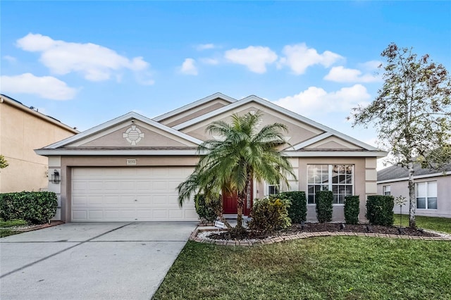 30350 Grymes Dr, Wesley Chapel, FL 33545 - single story home with stucco siding, driveway, a garage, and a front lawn