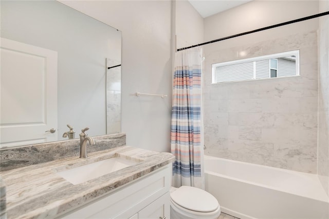 full bathroom featuring shower / tub combo with curtain, vanity, and toilet