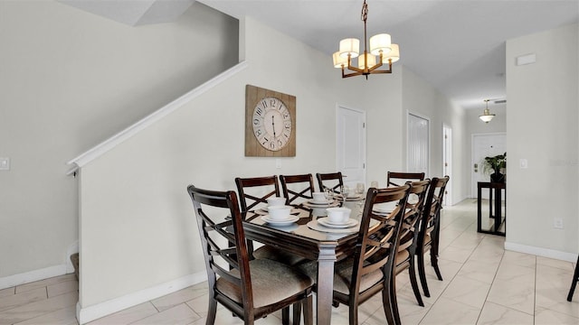 dining area featuring a chandelier