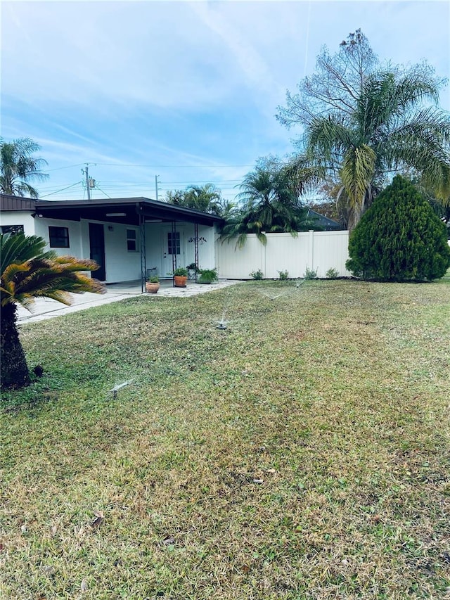 view of yard with a patio area