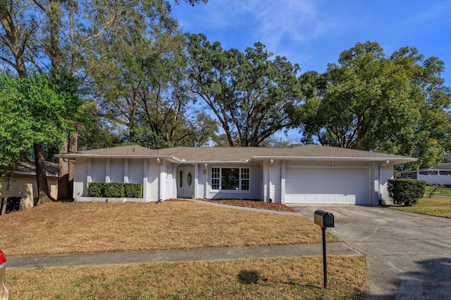 single story home with a garage