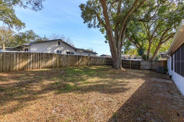 view of yard with central AC