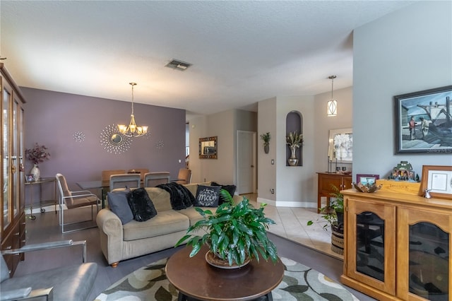 living room featuring an inviting chandelier