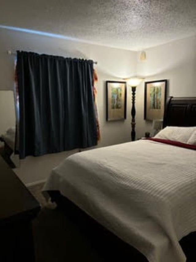 bedroom with a textured ceiling