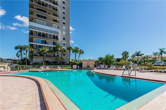 view of swimming pool with a patio