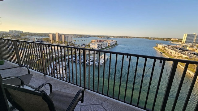 balcony with a city view and a water view