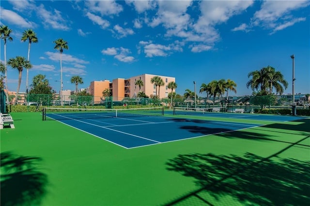 view of sport court with fence