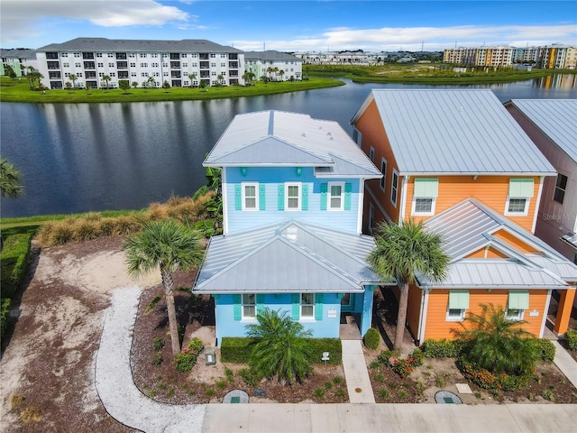 view of front of home with a water view