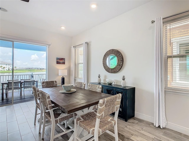 dining room with light hardwood / wood-style floors