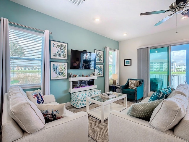 living room with ceiling fan