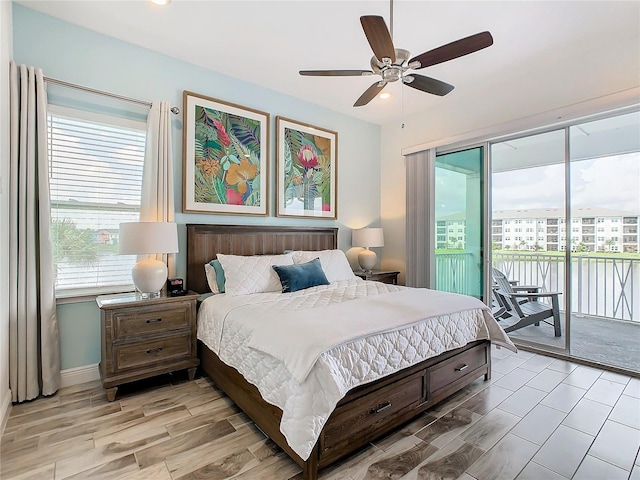 bedroom featuring ceiling fan, access to exterior, and light hardwood / wood-style floors