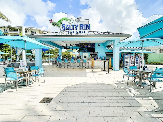 view of patio with a bar