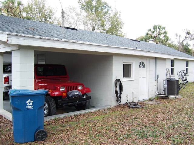 view of side of property with cooling unit