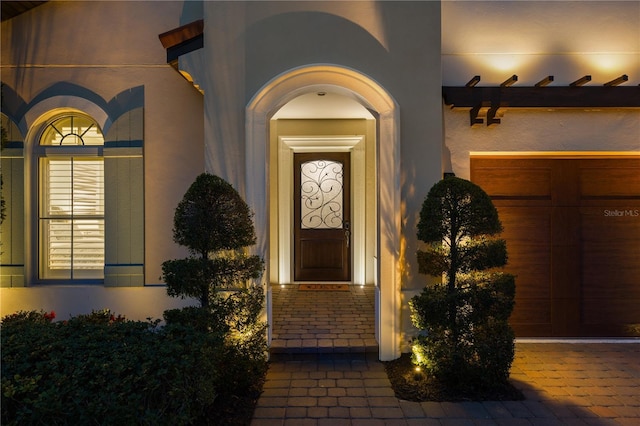 property entrance featuring a garage