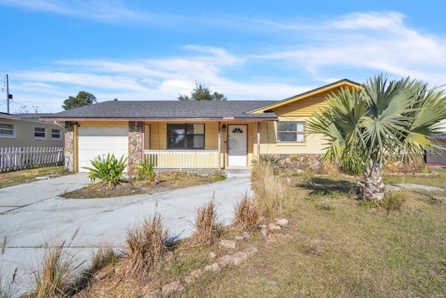 ranch-style home featuring a garage