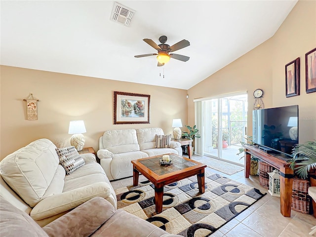 tiled living room with ceiling fan and vaulted ceiling