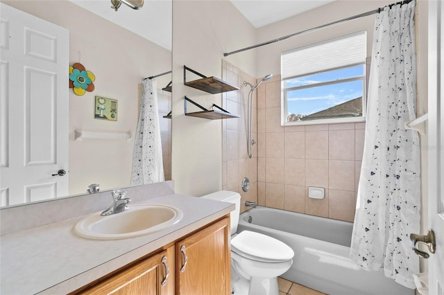 full bathroom featuring tile patterned floors, vanity, toilet, and shower / tub combo