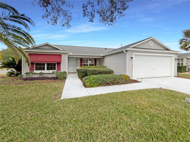 ranch-style home with a garage and a front lawn