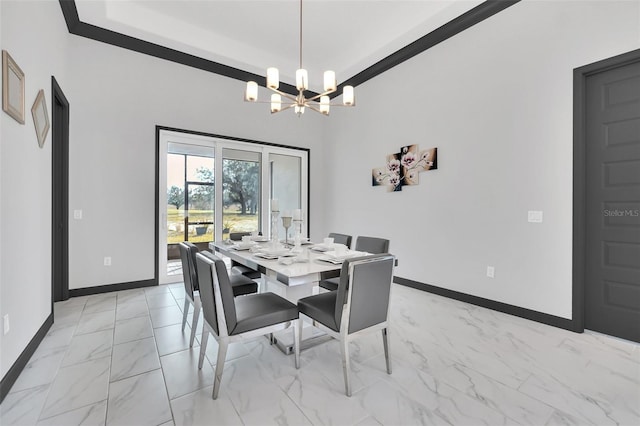 dining area featuring a notable chandelier