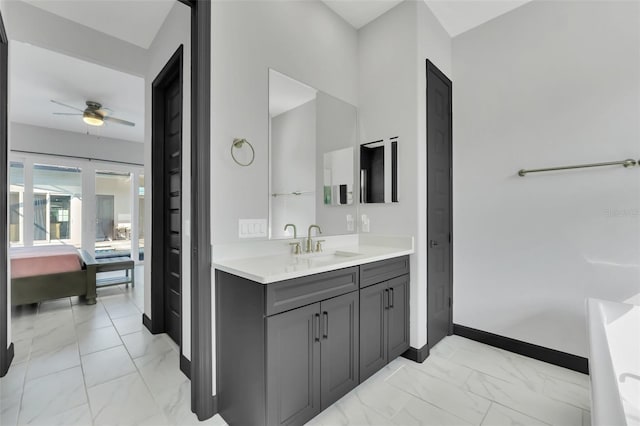 bathroom featuring vanity and ceiling fan