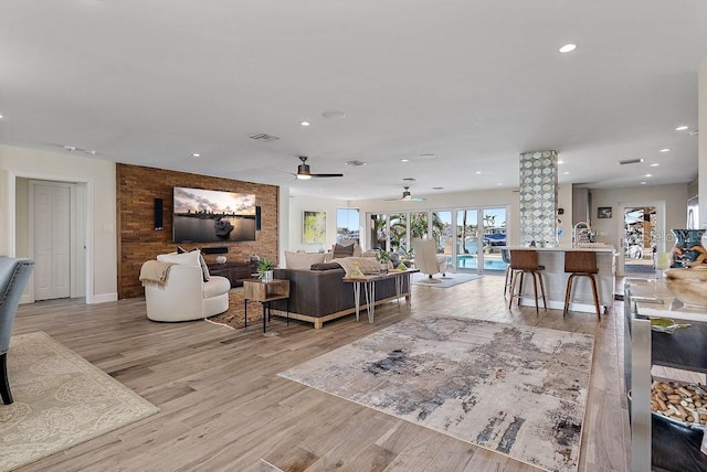 living room with light hardwood / wood-style floors