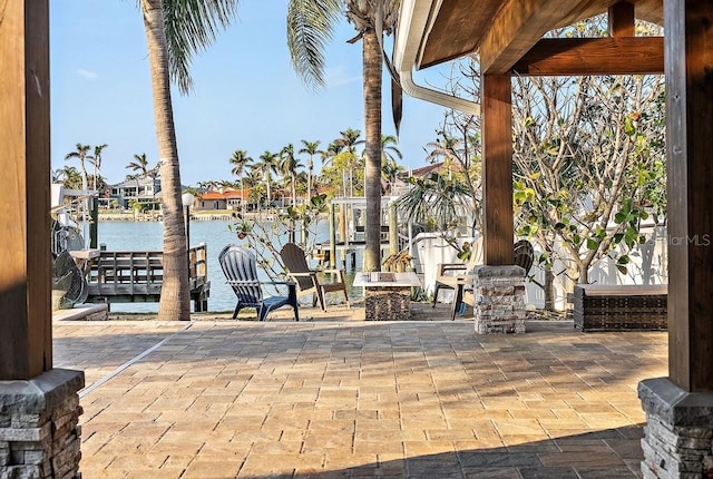 view of patio / terrace featuring a water view