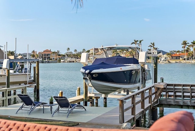 dock area featuring a water view