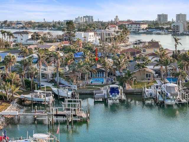 birds eye view of property featuring a water view