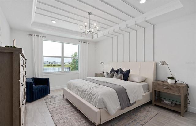 bedroom featuring a water view, a chandelier, light hardwood / wood-style flooring, and beamed ceiling